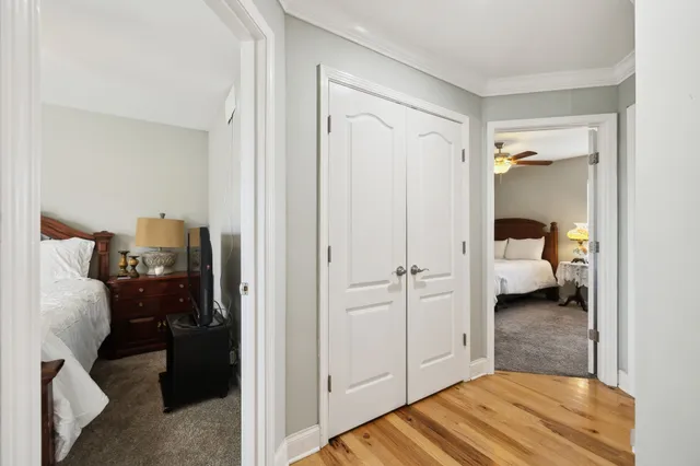 a bedroom with a bed and a view of bedroom