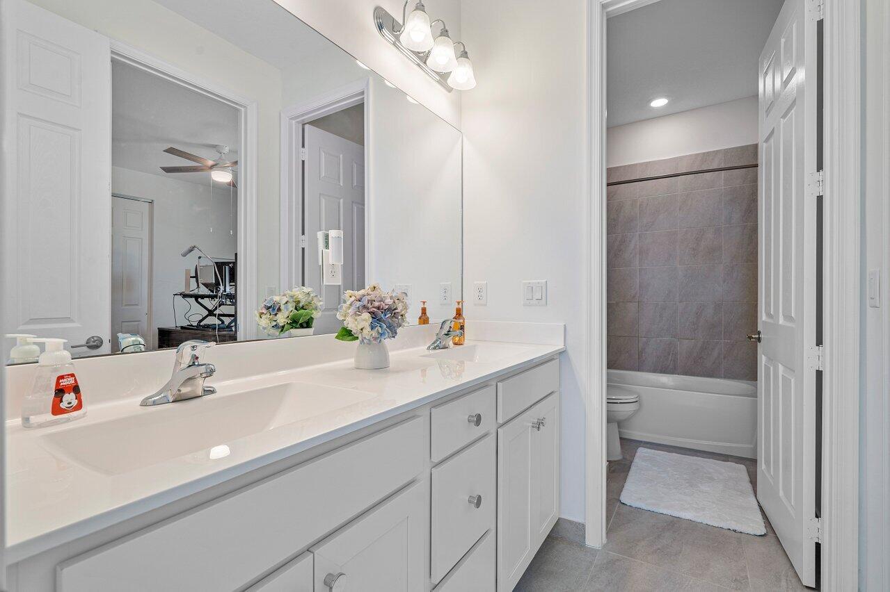 1134 Arrowhead Point Road Loxahatchee, FL 33470 - Photo 24 of 65 Jack and Jill Bathroom