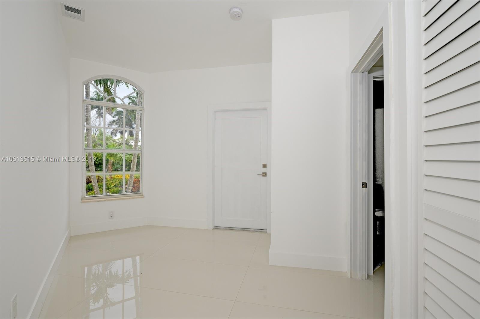 561 Ranch Road Weston, FL 33326 - Photo 23 of 46 a view of empty room with window