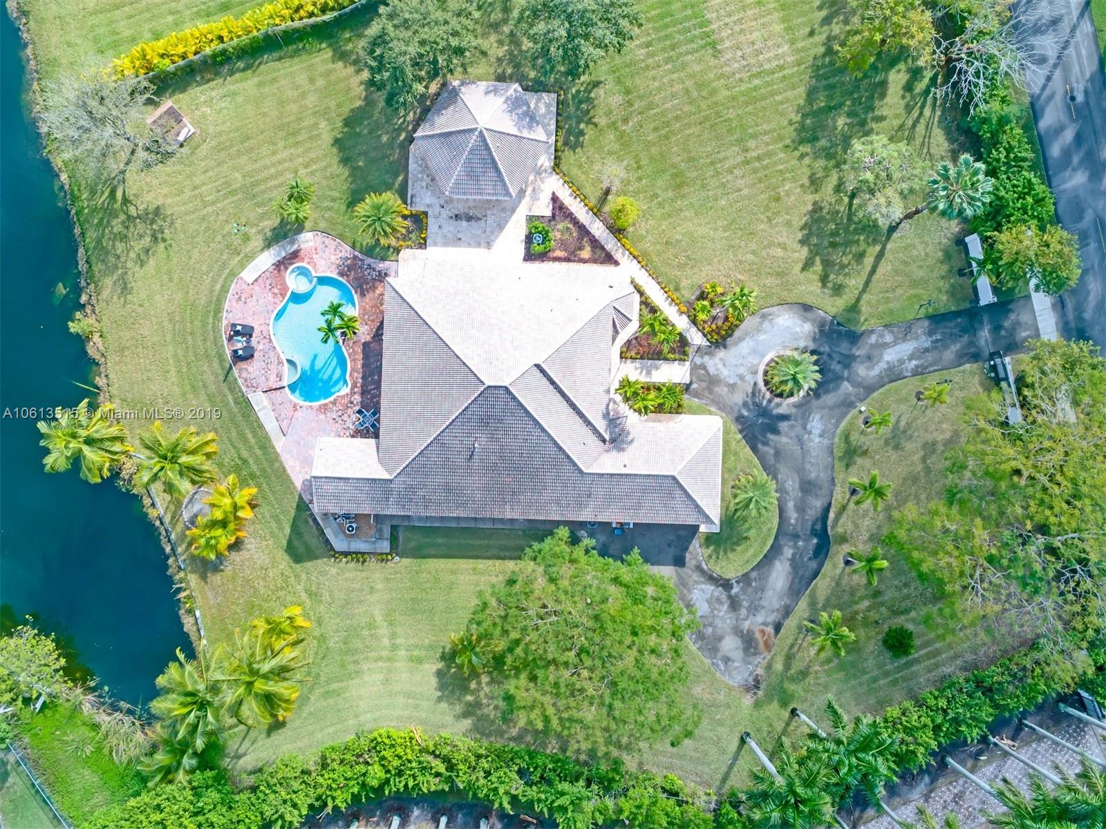561 Ranch Road Weston, FL 33326 - Photo 33 of 46 an aerial view of a house