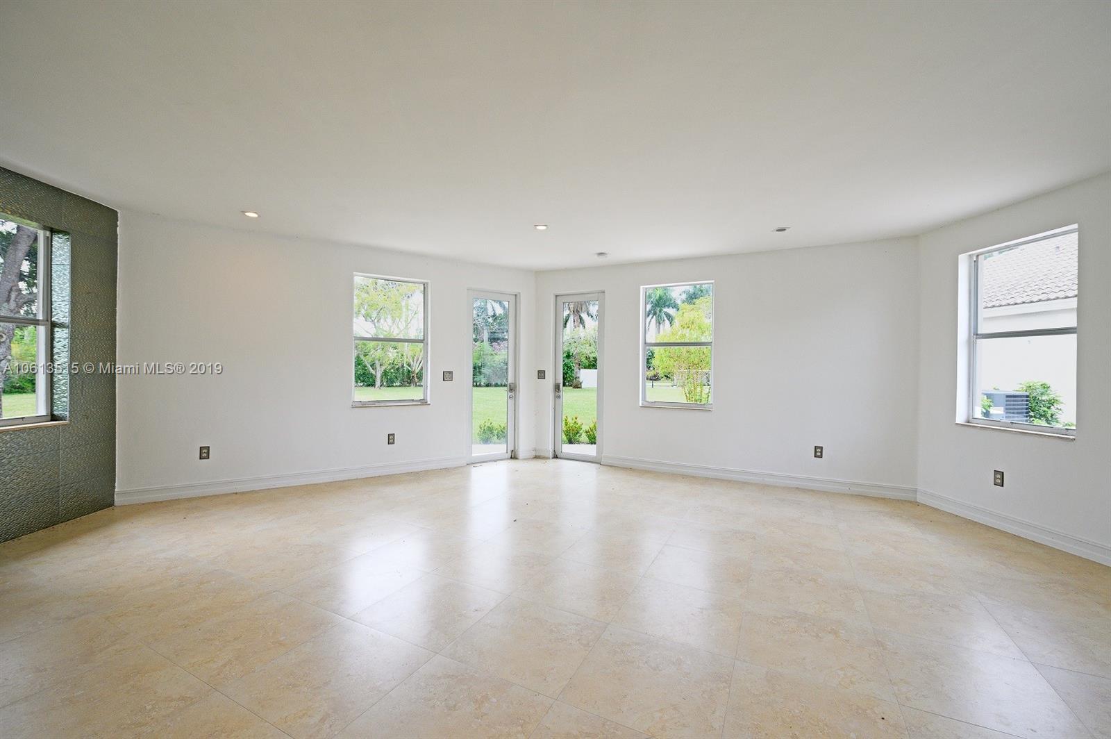 561 Ranch Road Weston, FL 33326 - Photo 36 of 46 an empty room with windows