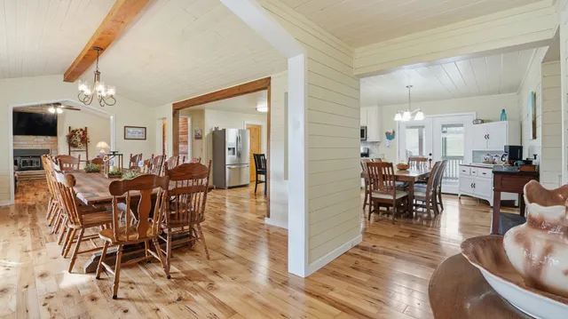 a view of a dining room with furniture