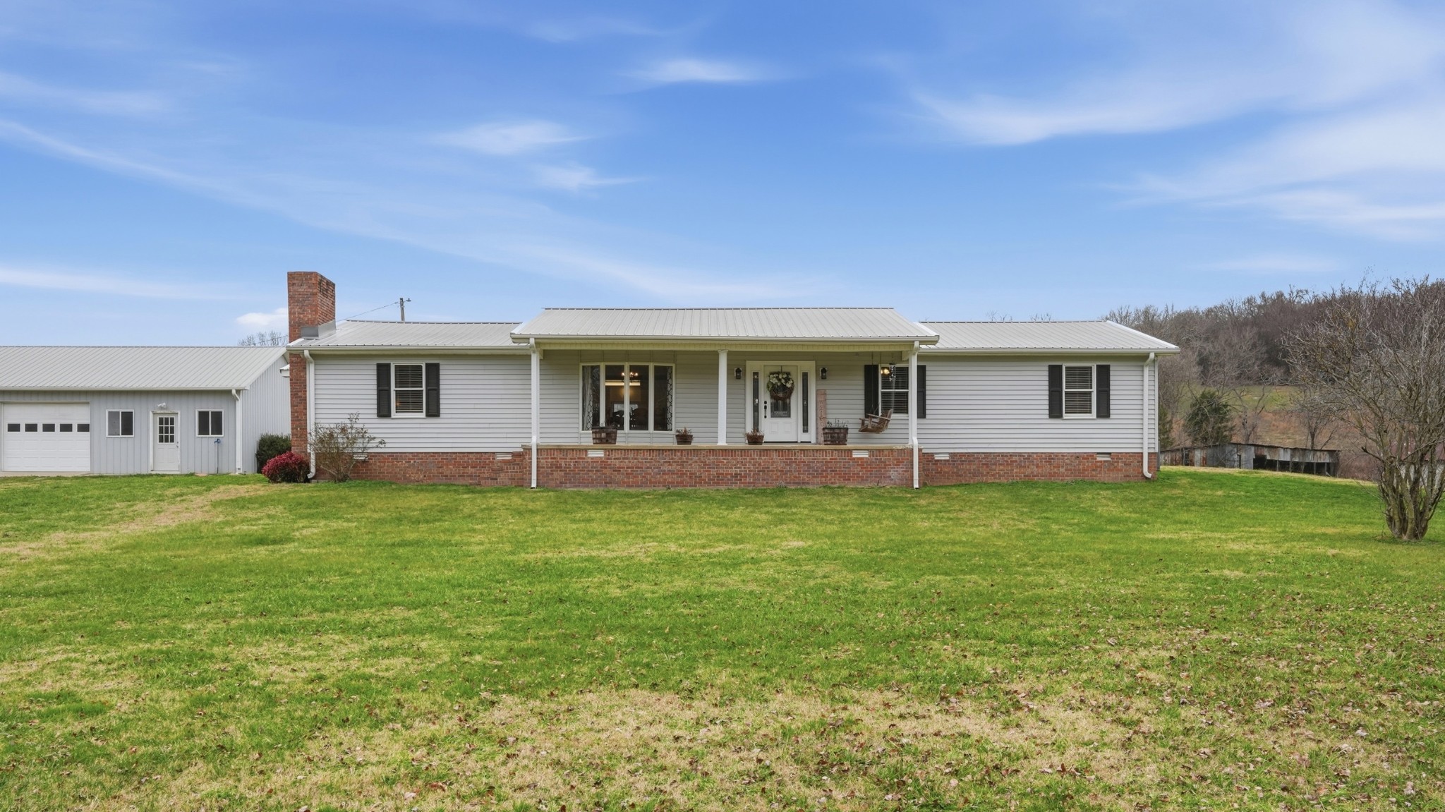 1101 Bagley Hollow Road Fayetteville, TN 37334 - Photo 2 of 52 a view of a yard in front of a house with large trees