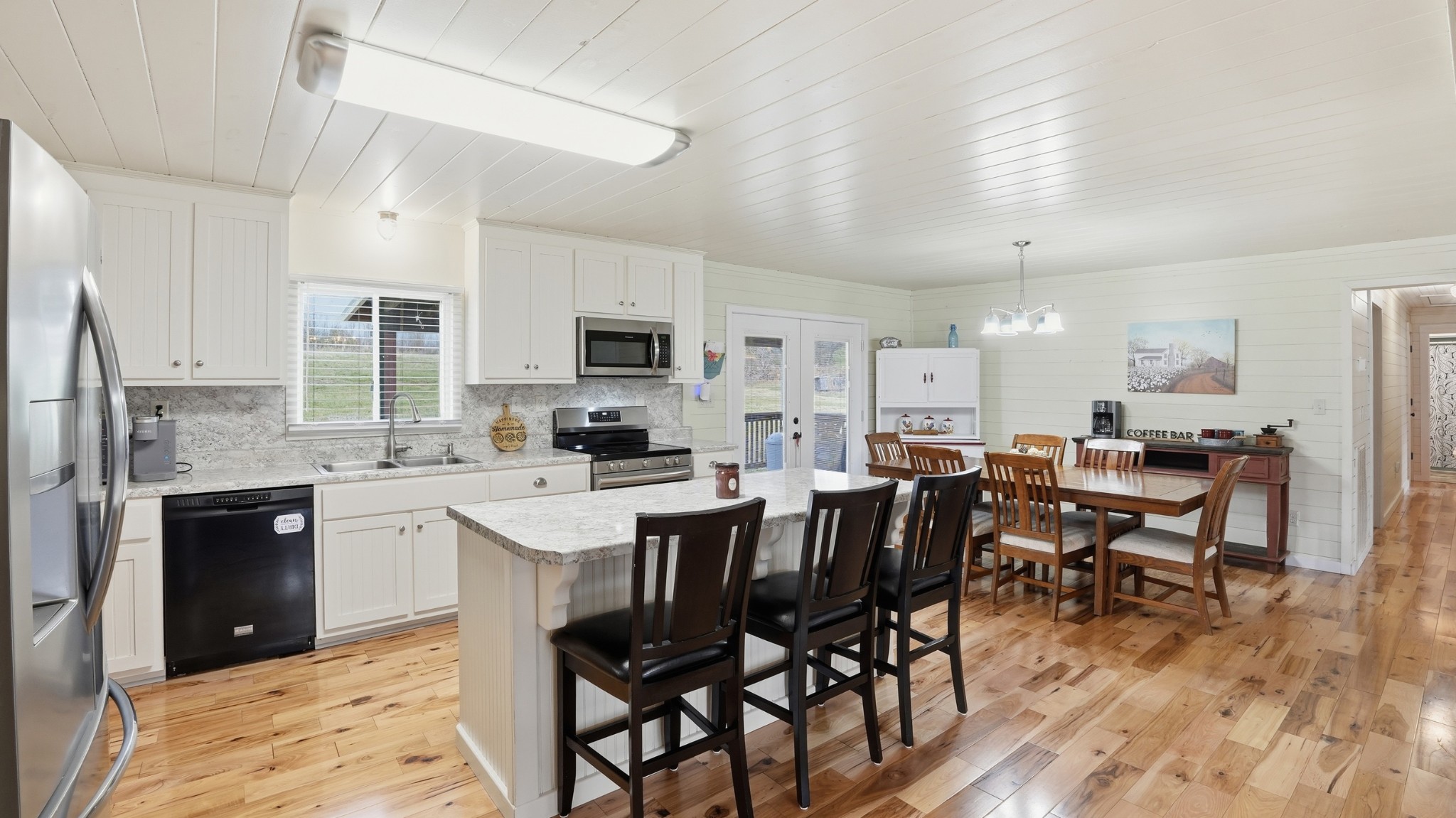 1101 Bagley Hollow Road Fayetteville, TN 37334 - Photo 22 of 52 a large kitchen with cabinets table and chairs