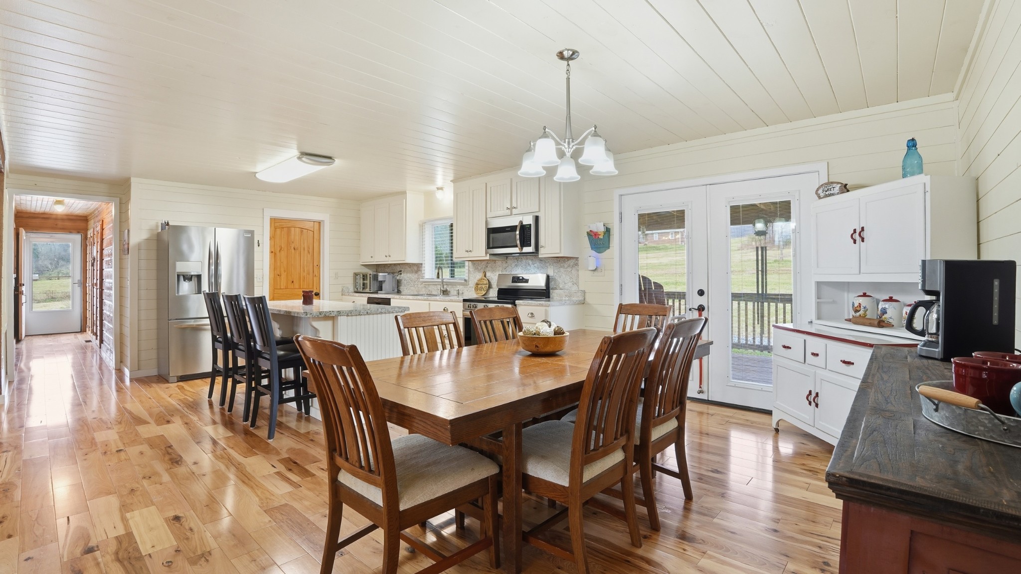1101 Bagley Hollow Road Fayetteville, TN 37334 - Photo 30 of 52 a view of a dining room with furniture wooden floor and chandelier
