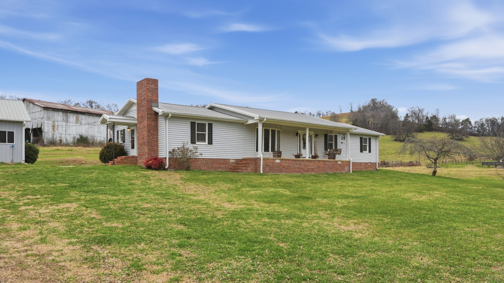 1101 Bagley Hollow Road Fayetteville, TN 37334 - Photo 3 of 52 a front view of a house with a garden