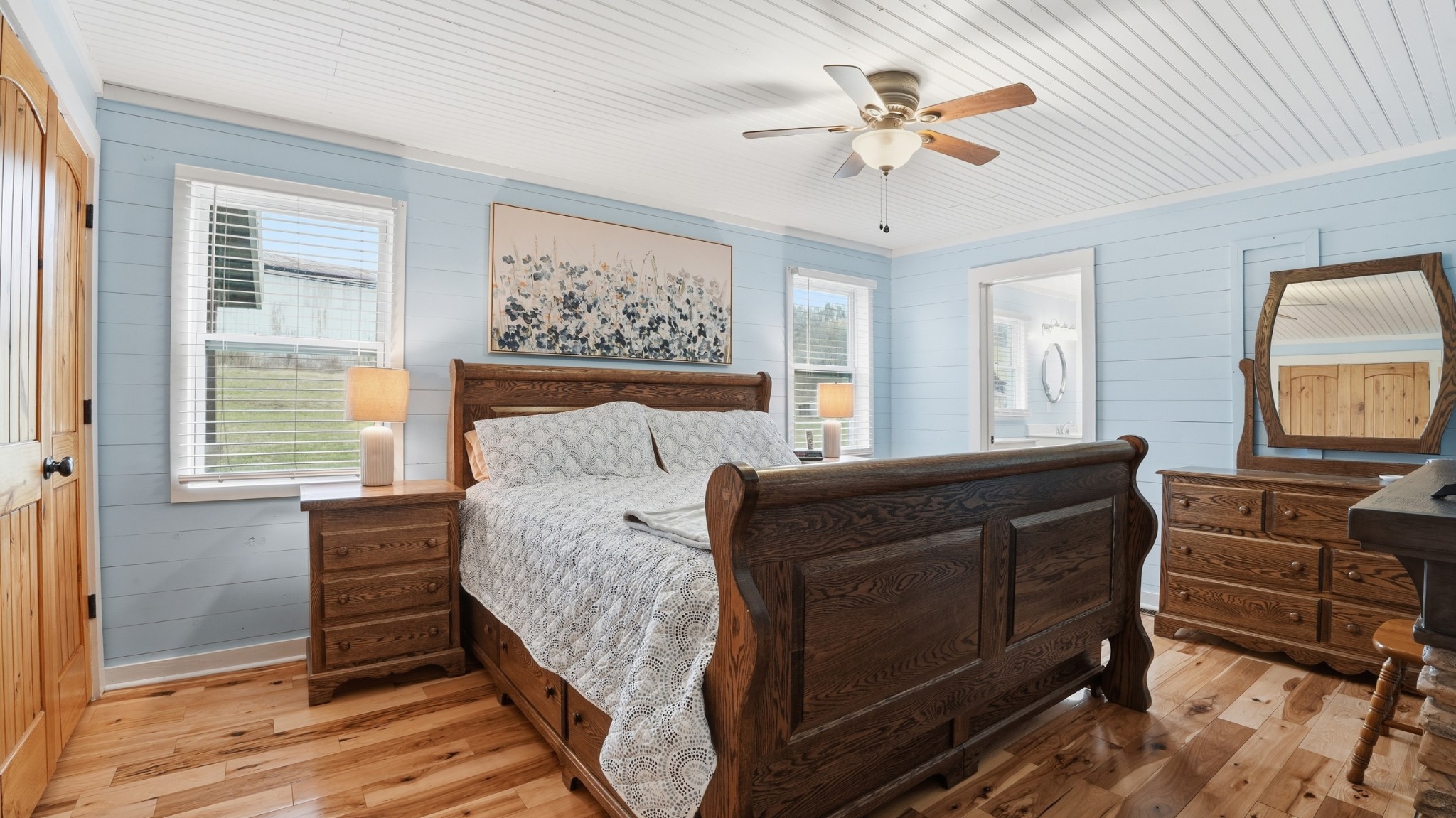 1101 Bagley Hollow Road Fayetteville, TN 37334 - Photo 32 of 52 a bedroom with a bed and a chandelier