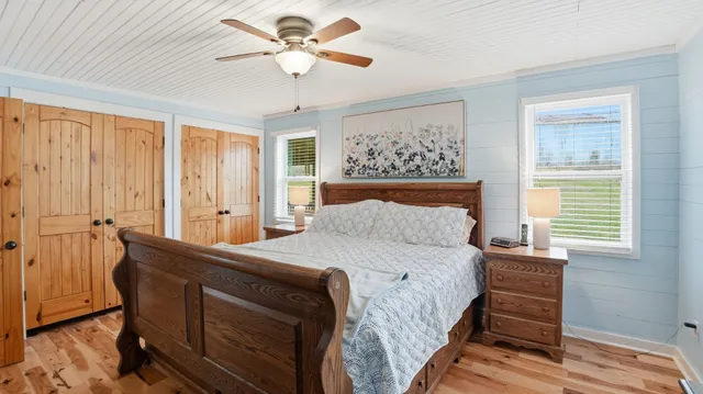 a bathroom with a sink a vanity and a mirror
