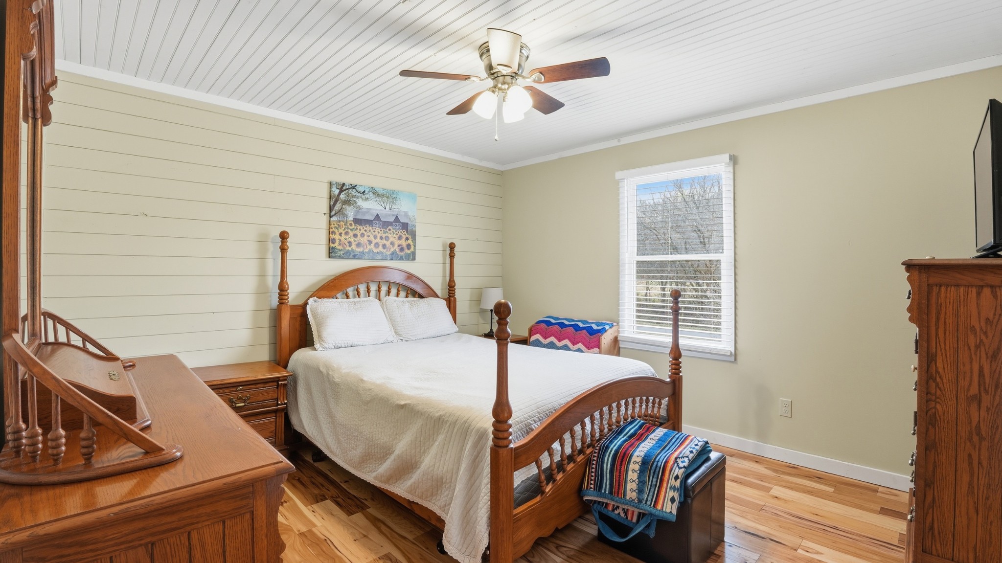 1101 Bagley Hollow Road Fayetteville, TN 37334 - Photo 42 of 52 a bedroom with a bed and a chandelier