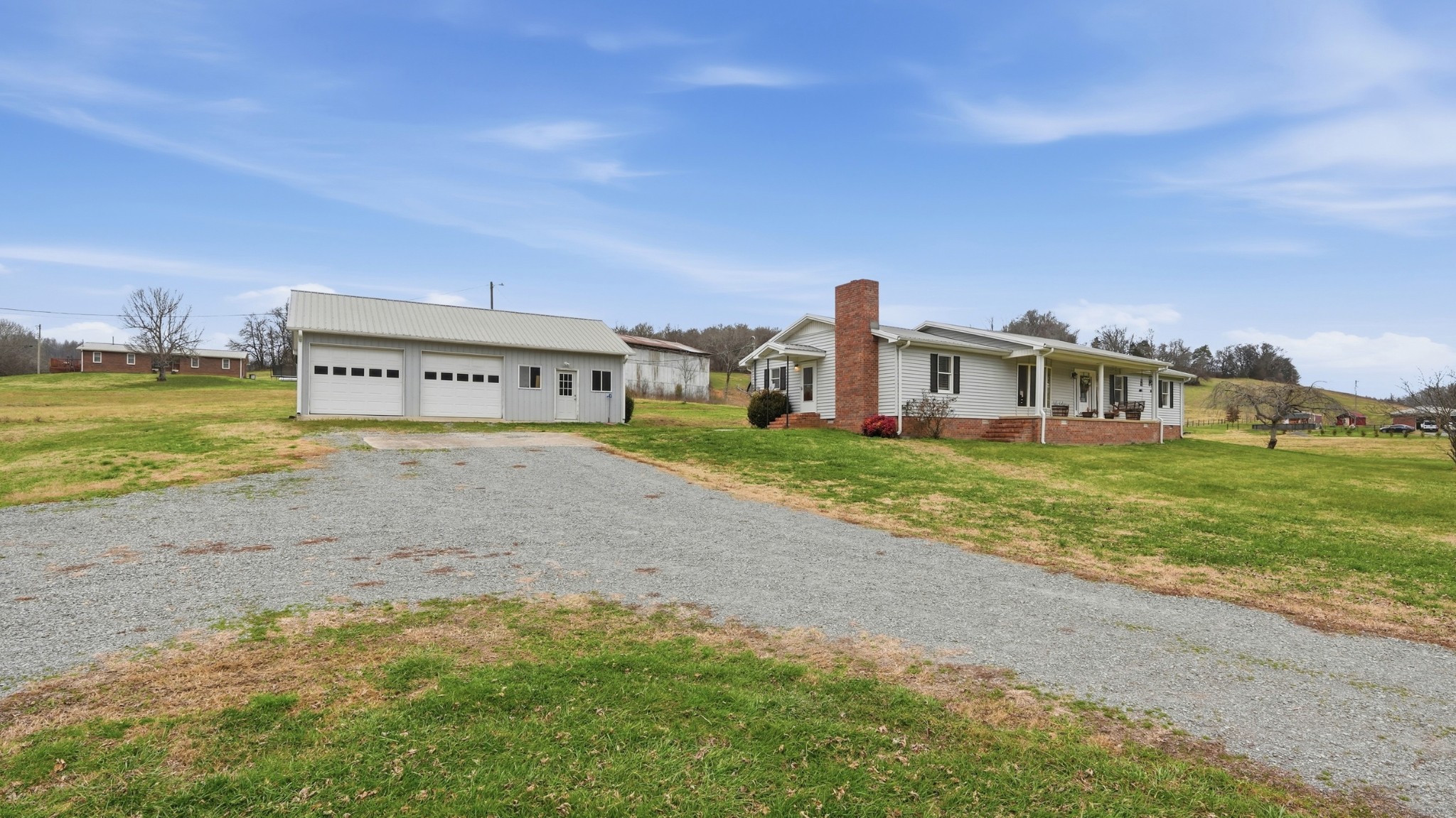 1101 Bagley Hollow Road Fayetteville, TN 37334 - Photo 5 of 52 a view of a big room with a big yard and large trees