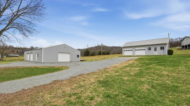 a house view with a big yard