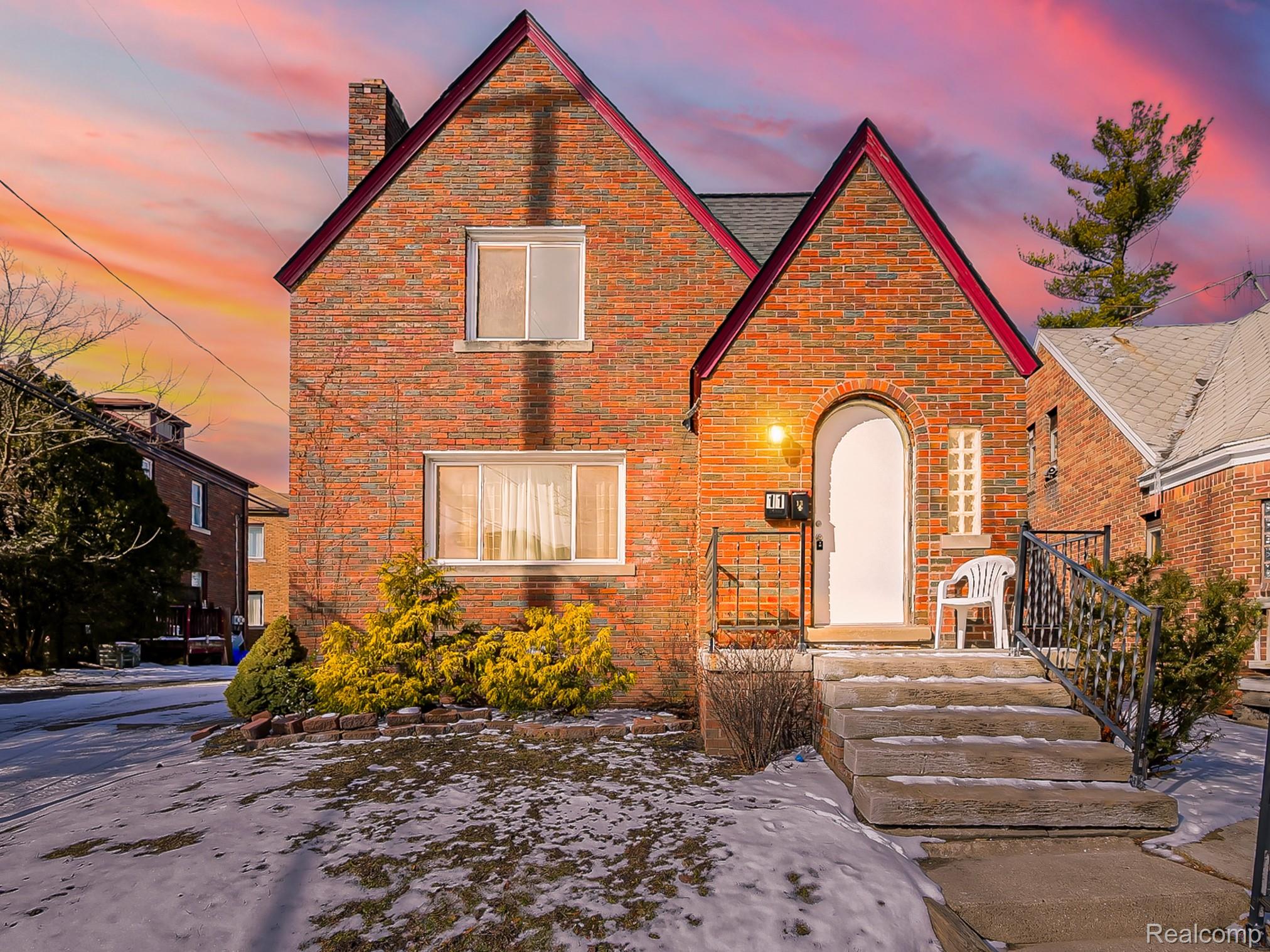 13 Mohawk Road Pontiac, MI 48341 - Photo 1 of 24 Tudor-style house featuring a chimney and brick siding