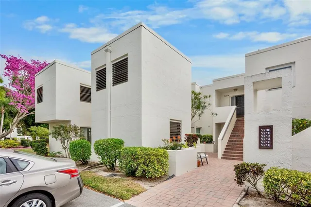 a house view with a outdoor space