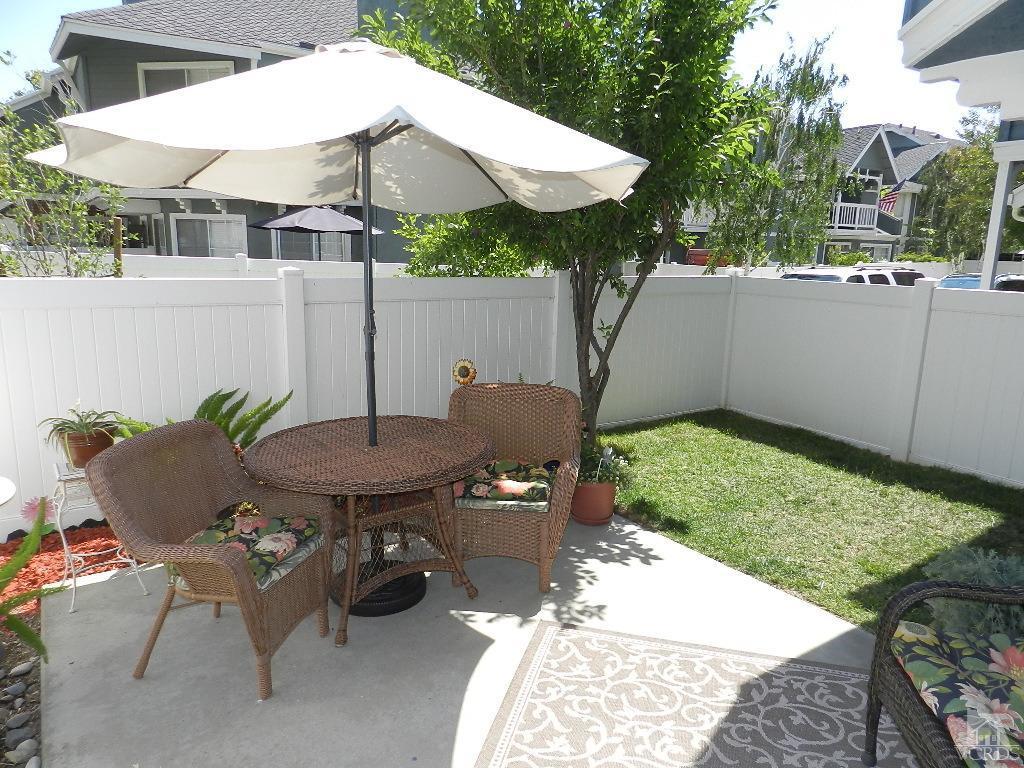 1866 Rory Lane, Unit 2 Simi Valley, CA 93063 - Photo 28 of 31 a view of a backyard with furniture and a table