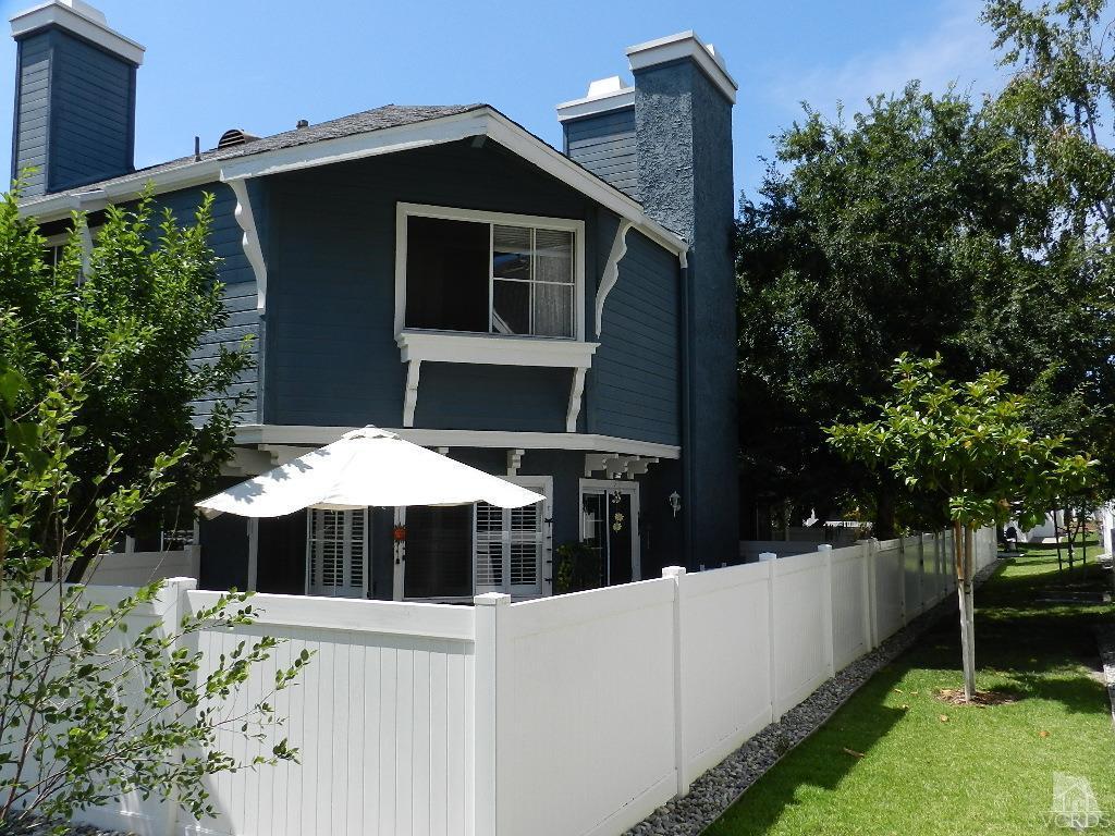 1866 Rory Lane, Unit 2 Simi Valley, CA 93063 - Photo 4 of 31 a view of a house with backyard and sitting area