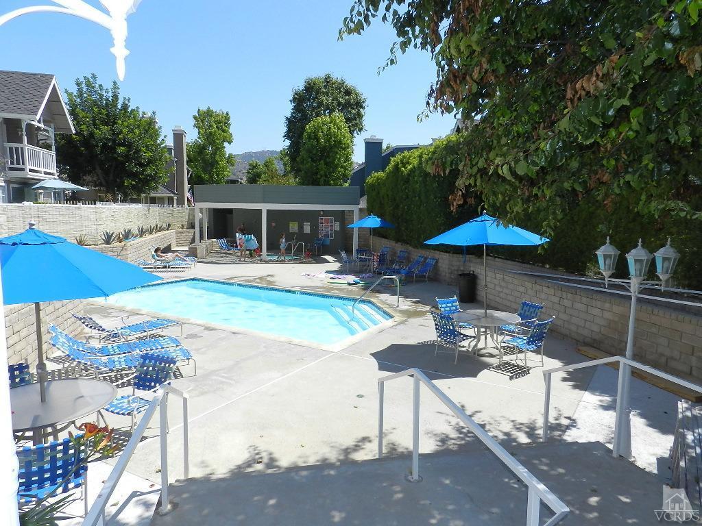1866 Rory Lane, Unit 2 Simi Valley, CA 93063 - Photo 31 of 31 a view of a backyard with furniture and a table