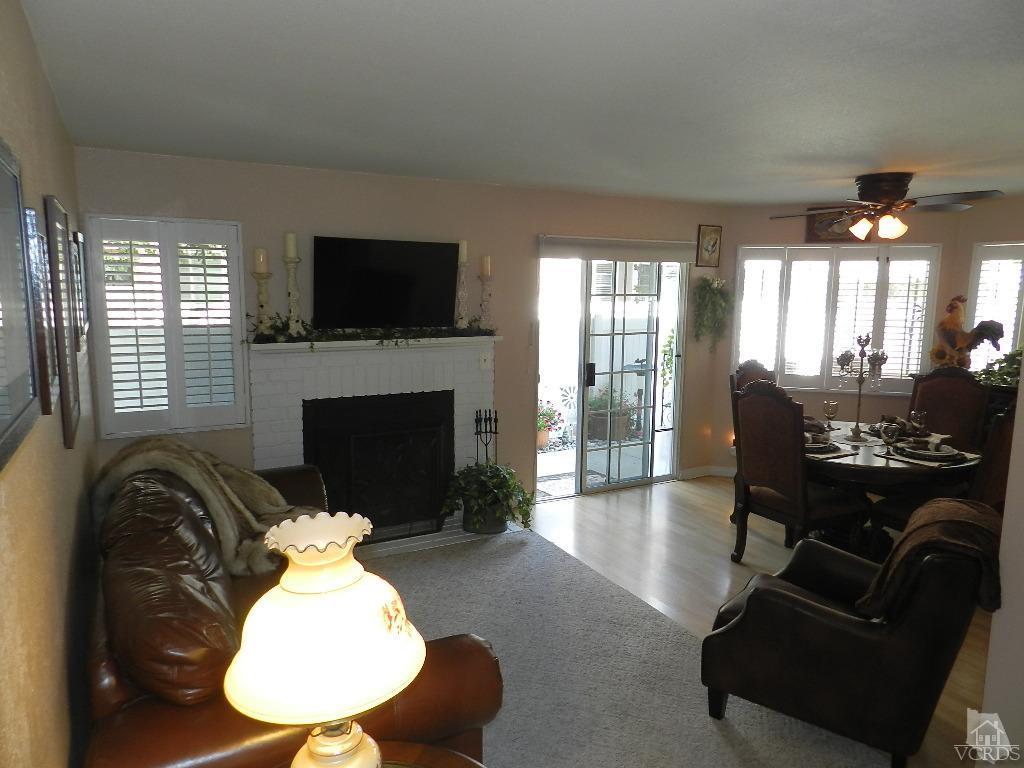 1866 Rory Lane, Unit 2 Simi Valley, CA 93063 - Photo 10 of 31 a living room with furniture fireplace and flat screen tv