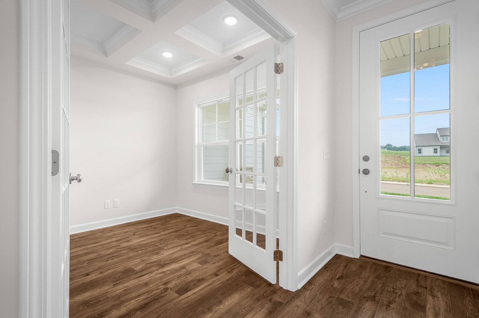 1733 Merkel Road Columbia, TN 38401 - Photo 9 of 53 an empty room with wooden floor and windows