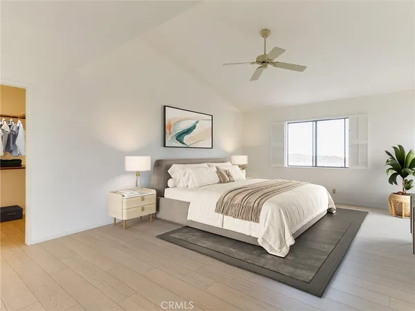 a living room with a bed furniture and window