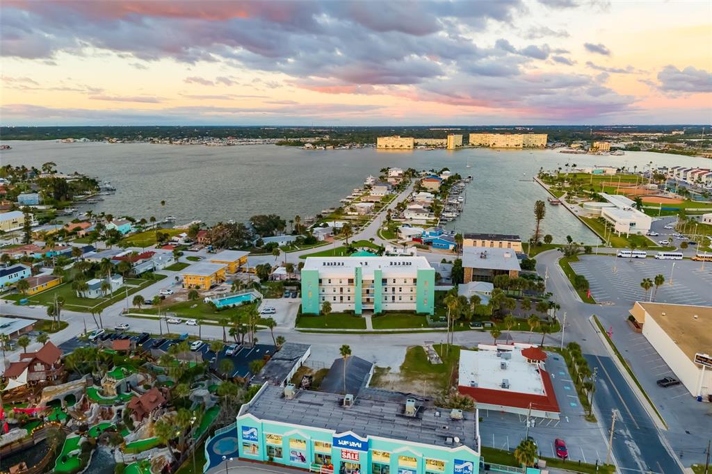 15305 1st Street East, Unit 201 Madeira Beach, FL 33708 - Photo 6 of 41 a view of lake and yard