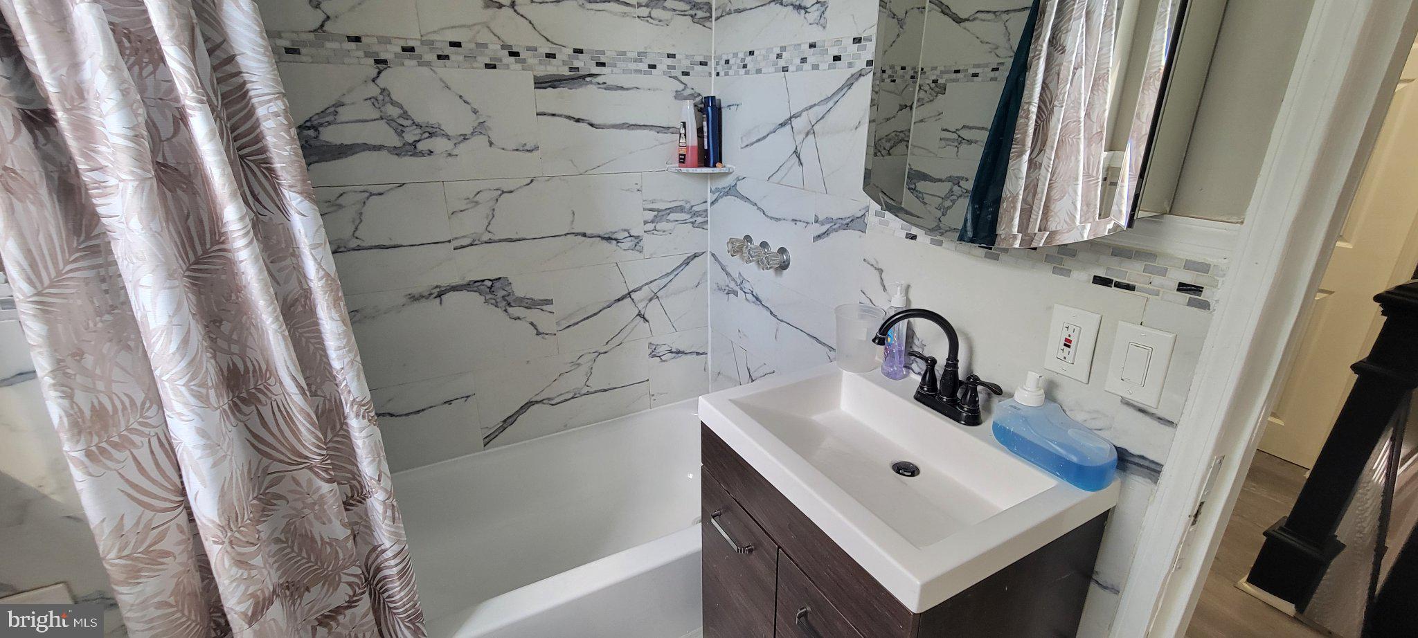 209 North 10th Street Darby, PA 19023 - Photo 18 of 26 Modern bathroom with elegant finishes.