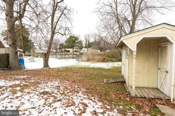 a view of back yard of the house