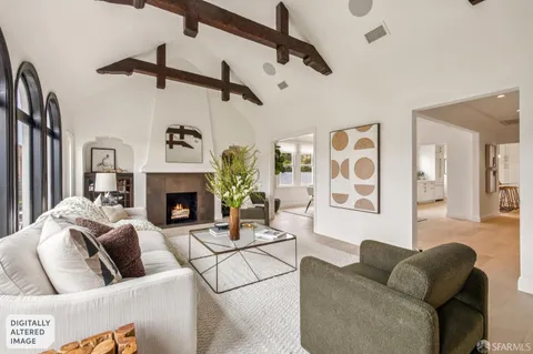 a kitchen with stainless steel appliances a sink a stove a window and cabinets