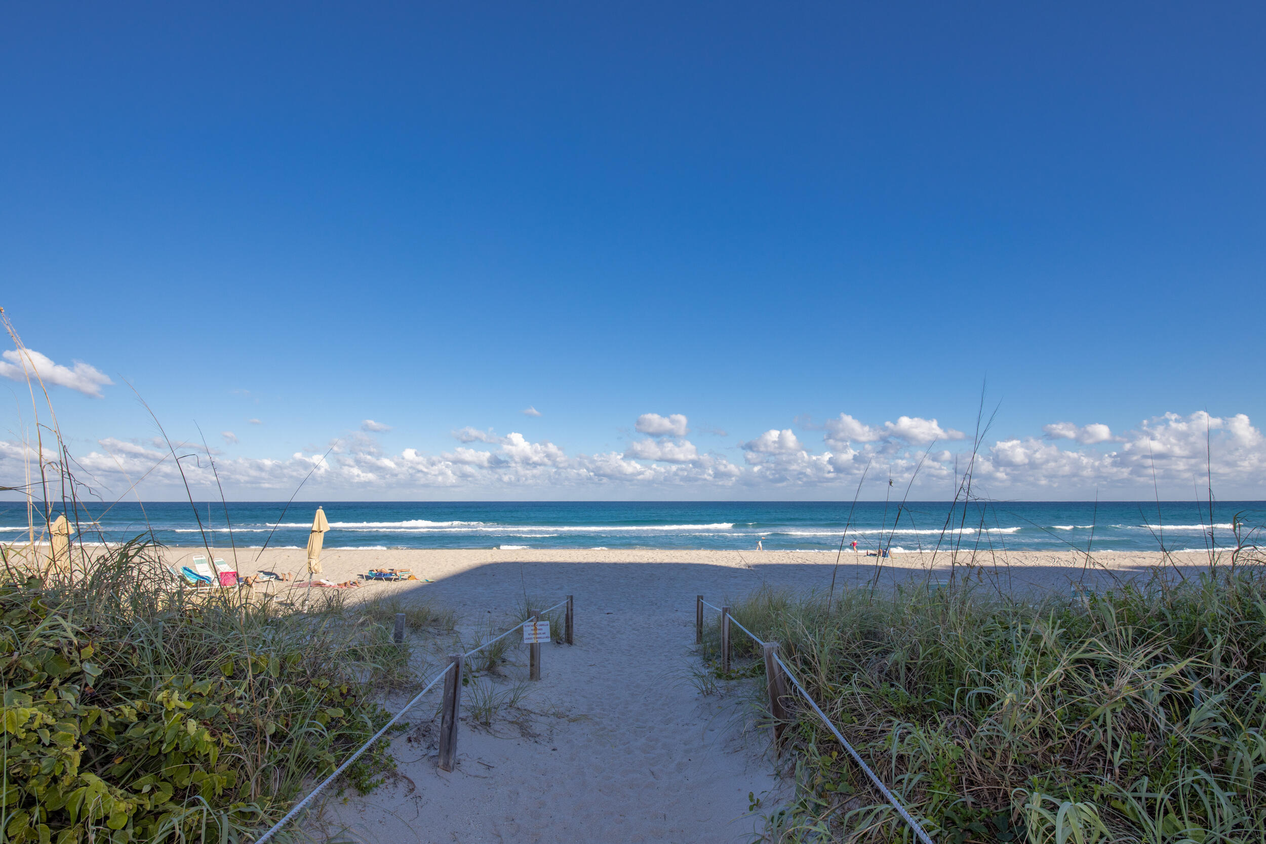 2565 South Ocean Boulevard, Unit 1040 (104) Palm Beach, FL 33480 - Photo 1 of 26 a view of swimming pool and sunset