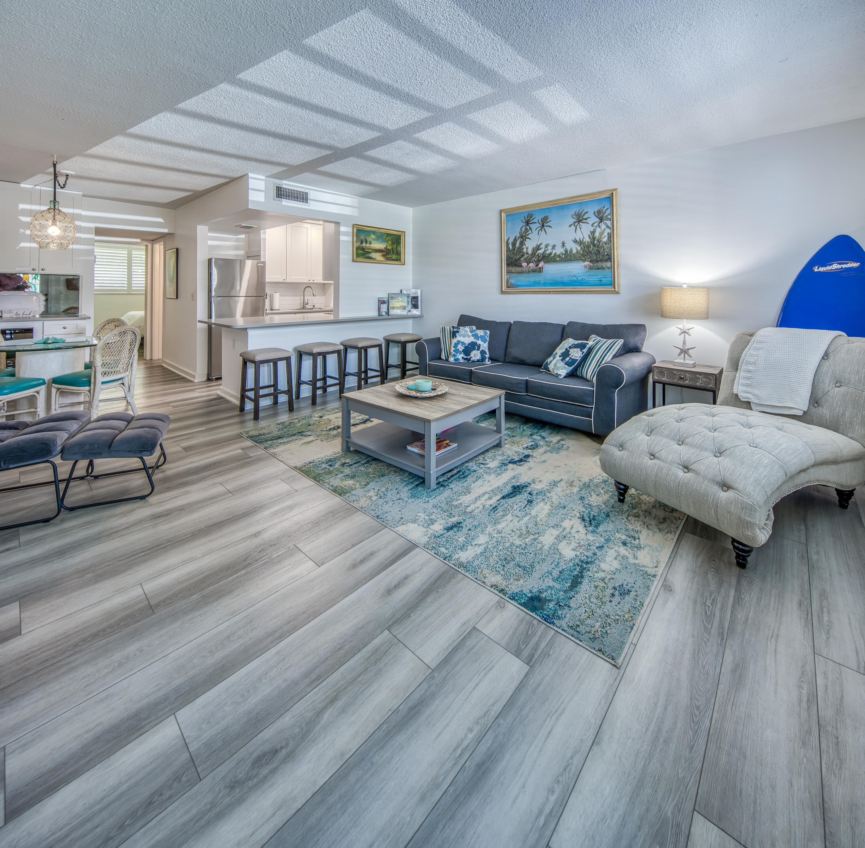 2565 South Ocean Boulevard, Unit 1040 (104) Palm Beach, FL 33480 - Photo 2 of 26 a living room with furniture and wooden floor