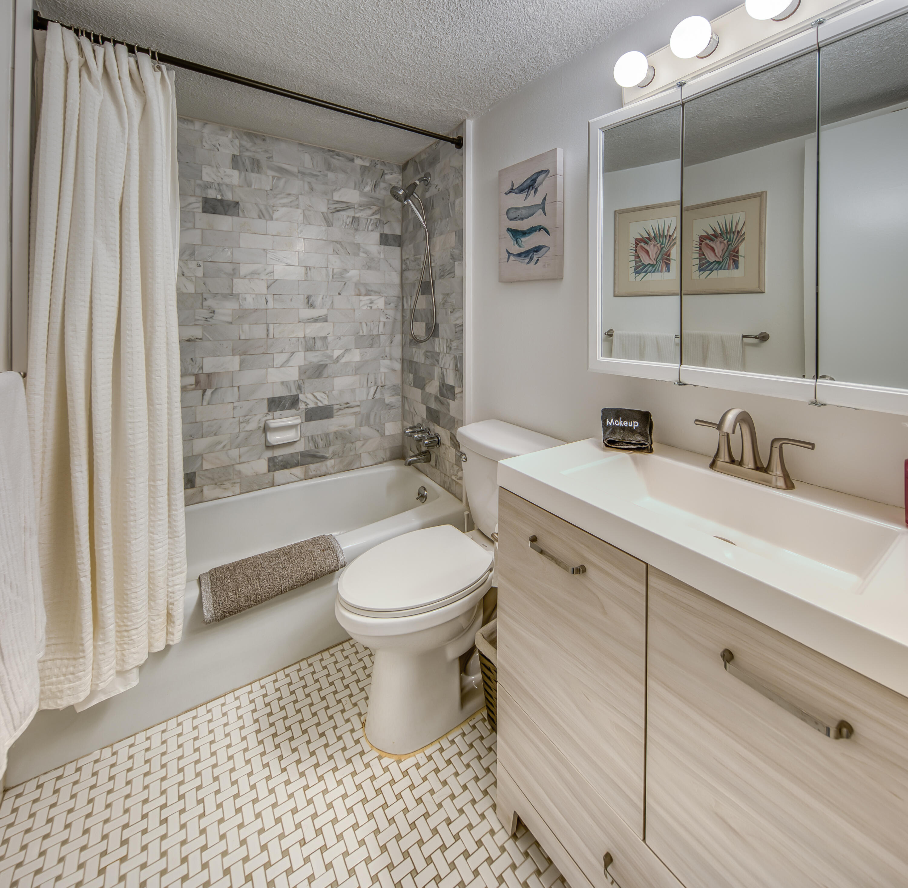2565 South Ocean Boulevard, Unit 1040 (104) Palm Beach, FL 33480 - Photo 7 of 26 a bathroom with a sink a toilet and shower