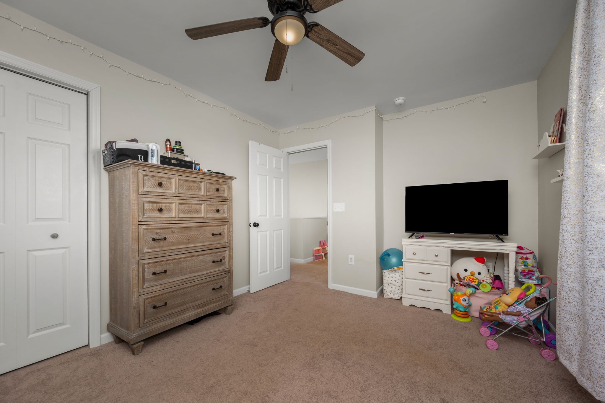 5571 Compass Way Christiana, TN 37037 - Photo 16 of 23 a view of a livingroom with furniture and a flat screen tv