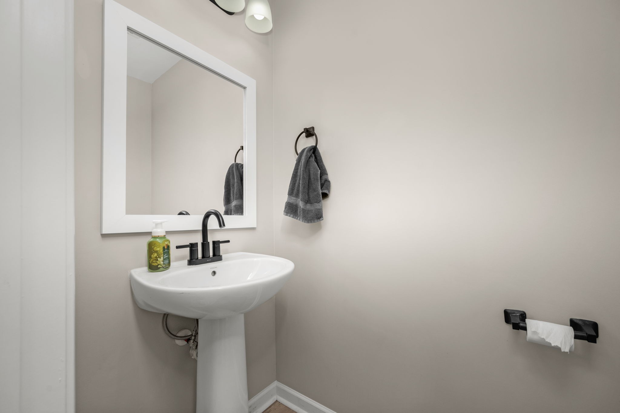 5571 Compass Way Christiana, TN 37037 - Photo 19 of 23 a bathroom with a sink and mirror