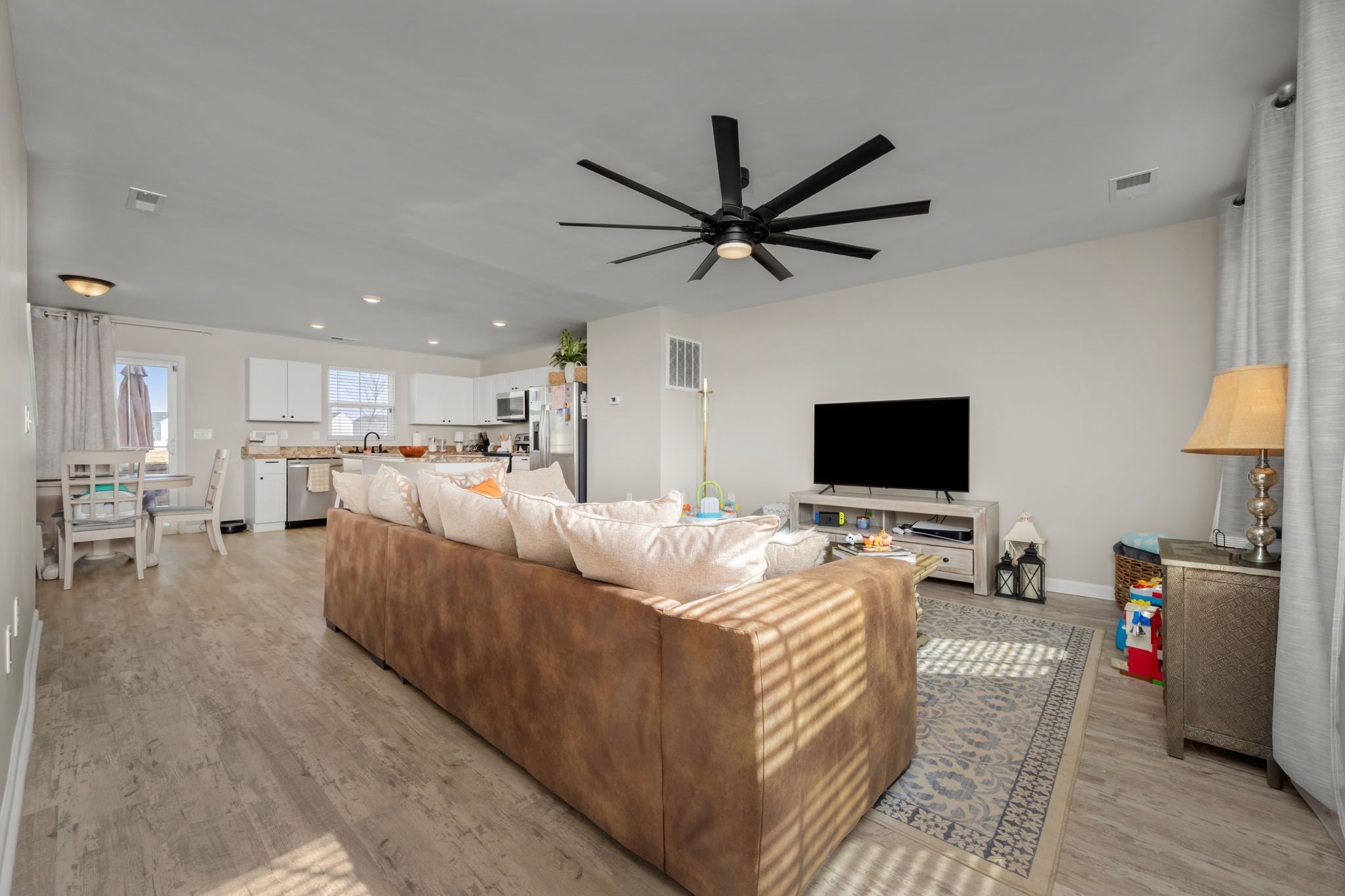 5571 Compass Way Christiana, TN 37037 - Photo 3 of 23 a living room with furniture and a flat screen tv