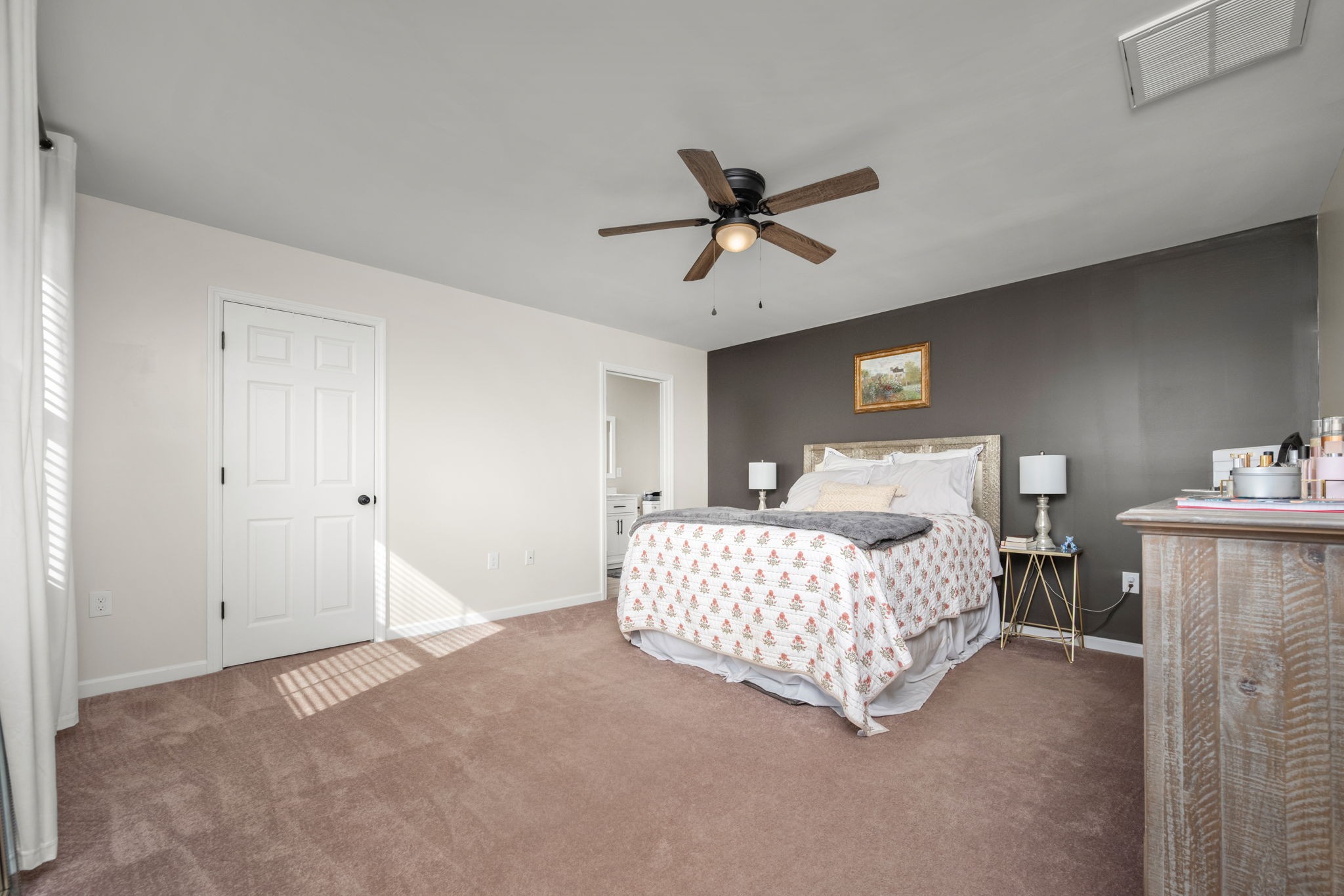 5571 Compass Way Christiana, TN 37037 - Photo 10 of 23 a bedroom with a bed and a chandelier