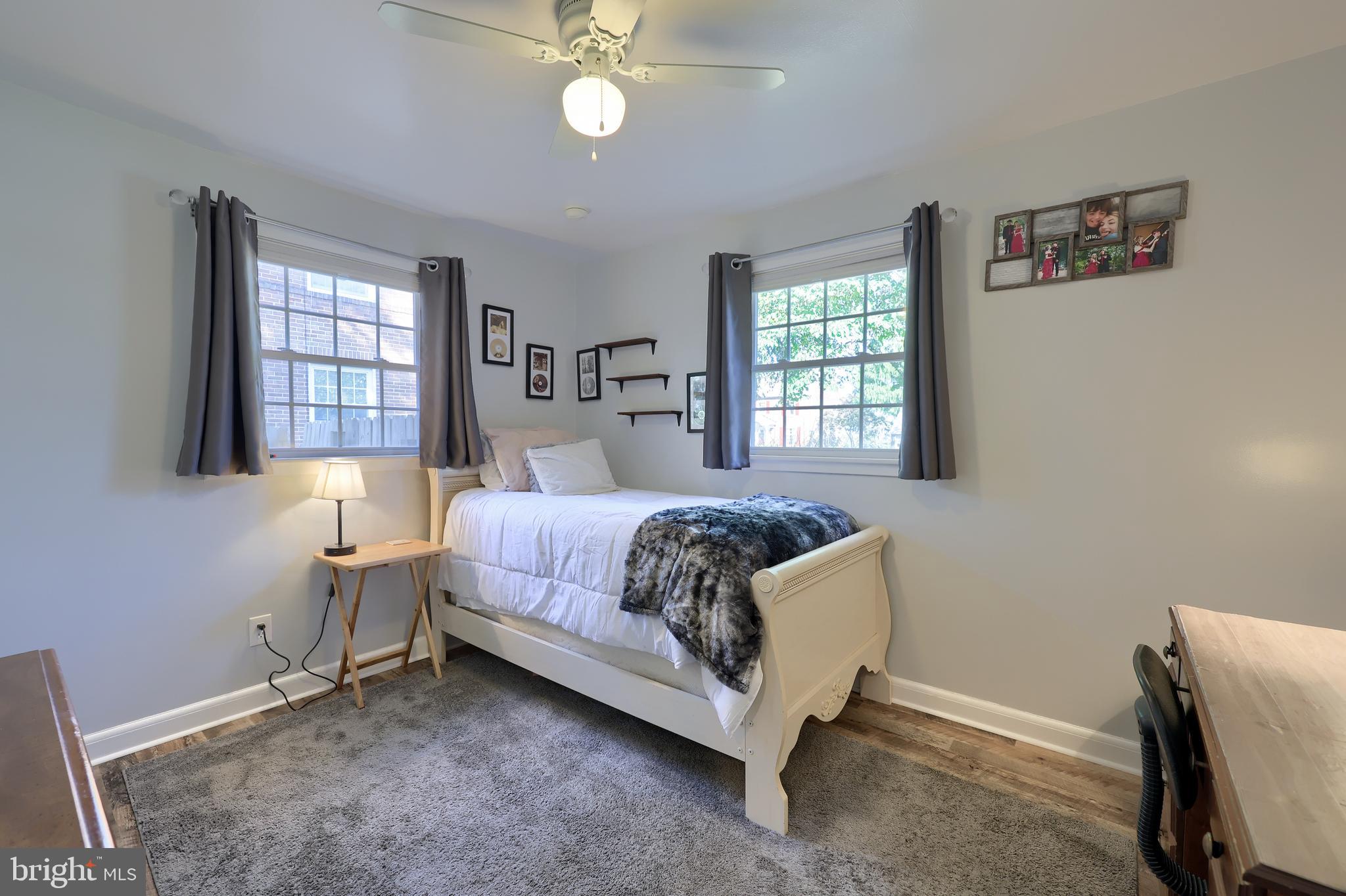304 Edgehill Road York, PA 17403 - Photo 31 of 44 a bed sitting in a bedroom next to a window