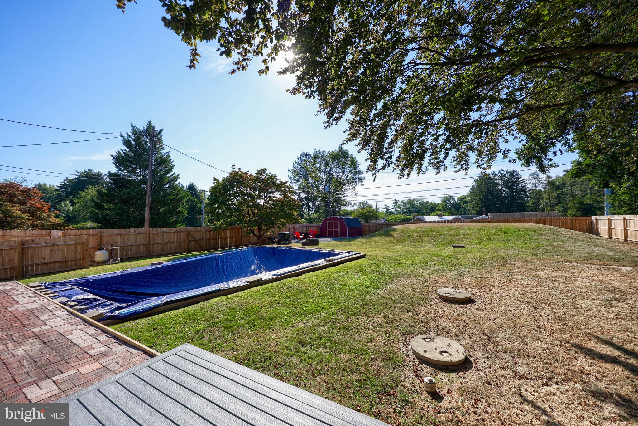 304 Edgehill Road York, PA 17403 - Photo 38 of 44 a view of a backyard with swimming pool
