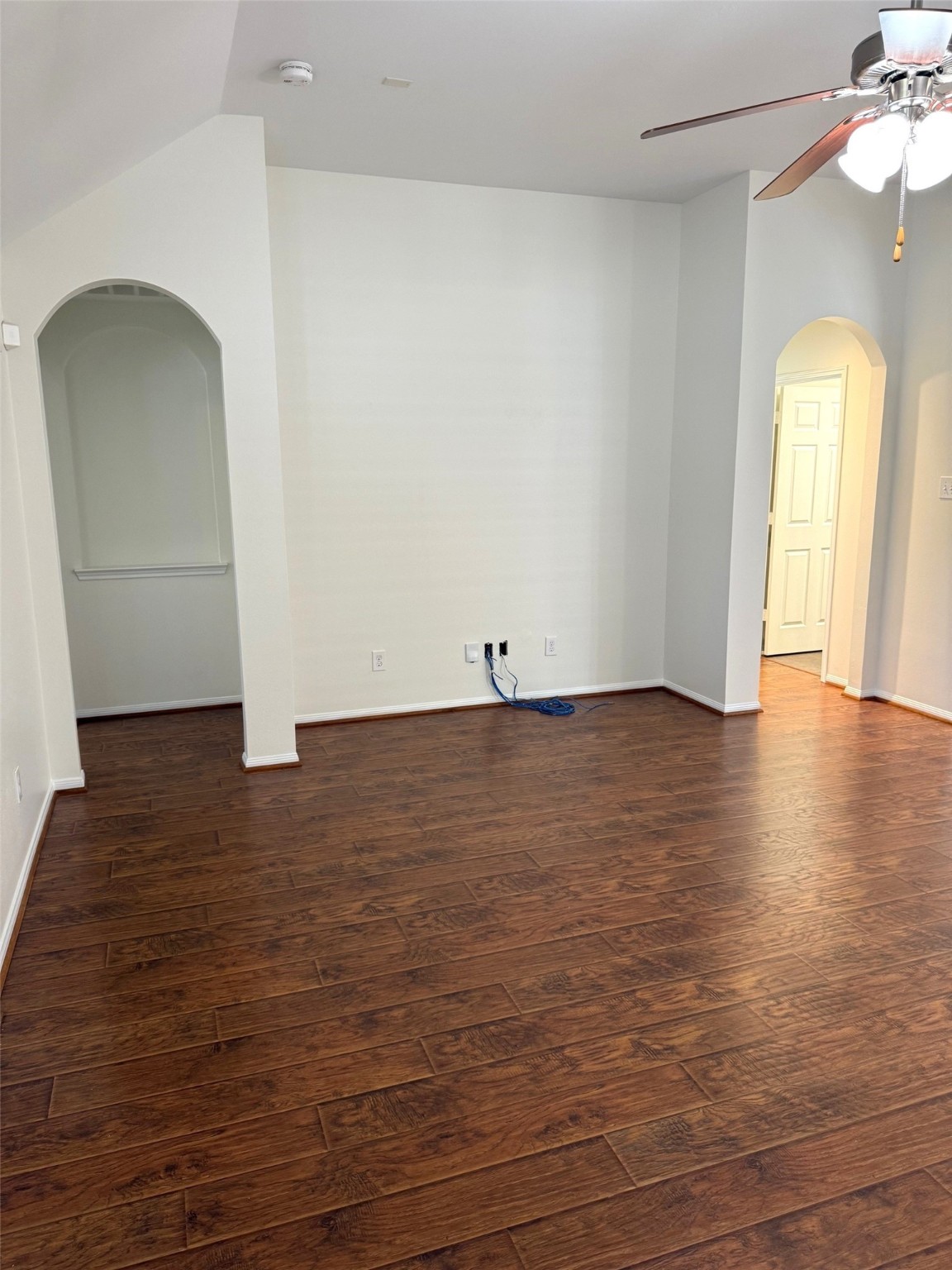 16818 Ranger Ridge Drive Cypress, TX 77429 - Photo 13 of 31 an empty room with wooden floor and window