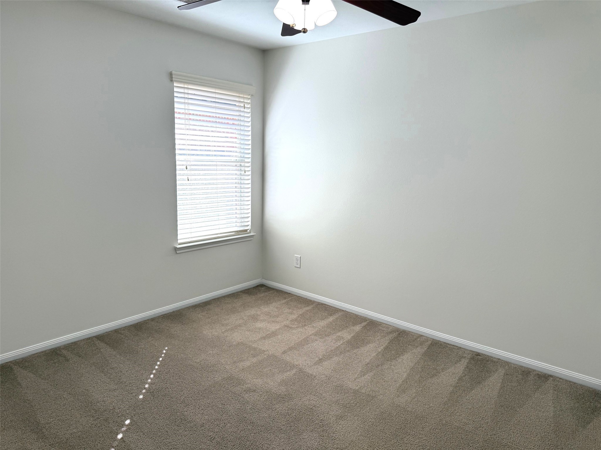 16818 Ranger Ridge Drive Cypress, TX 77429 - Photo 23 of 31 an empty room with a window