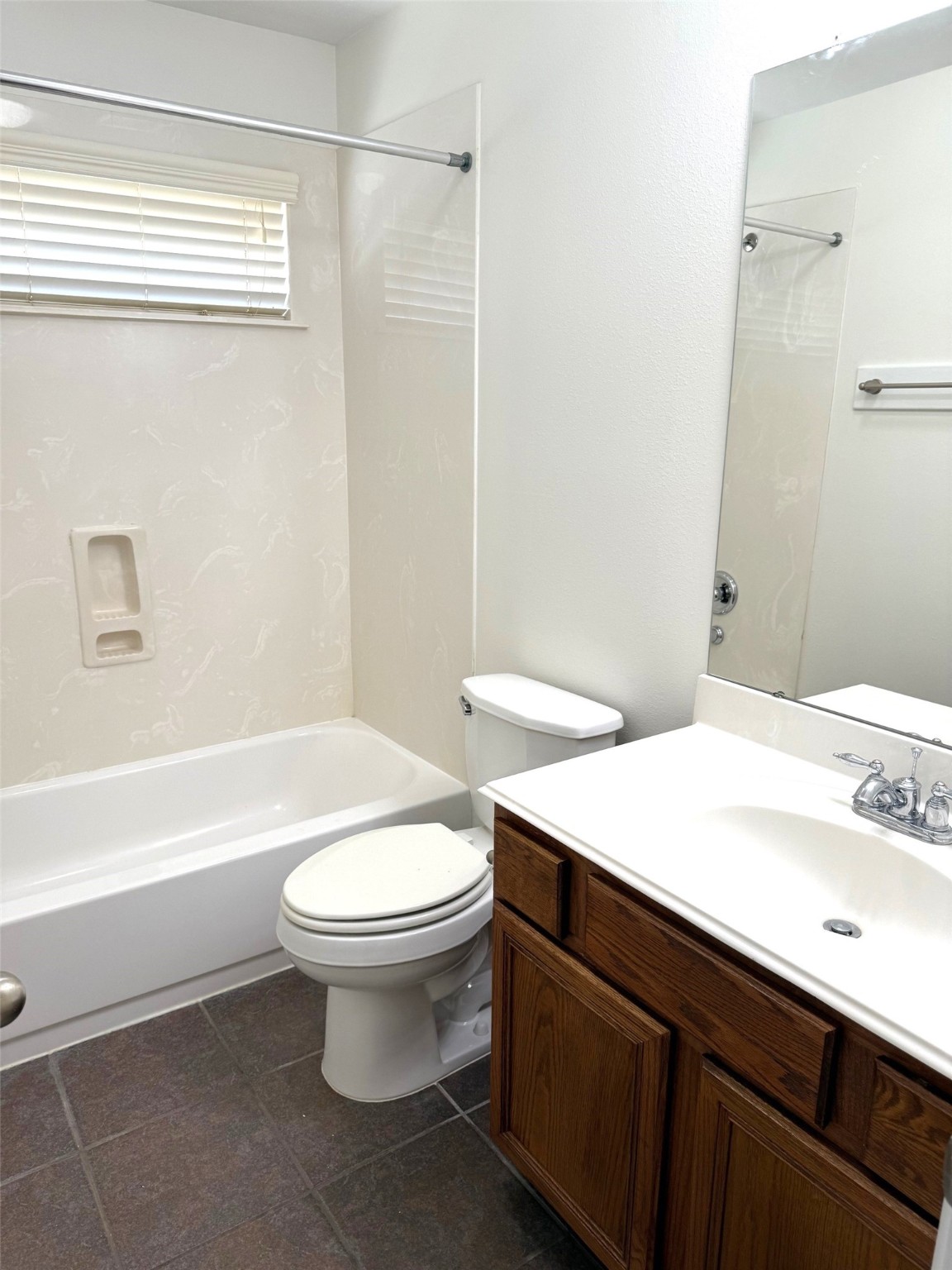 16818 Ranger Ridge Drive Cypress, TX 77429 - Photo 24 of 31 a bathroom with a sink a toilet and a bathtub