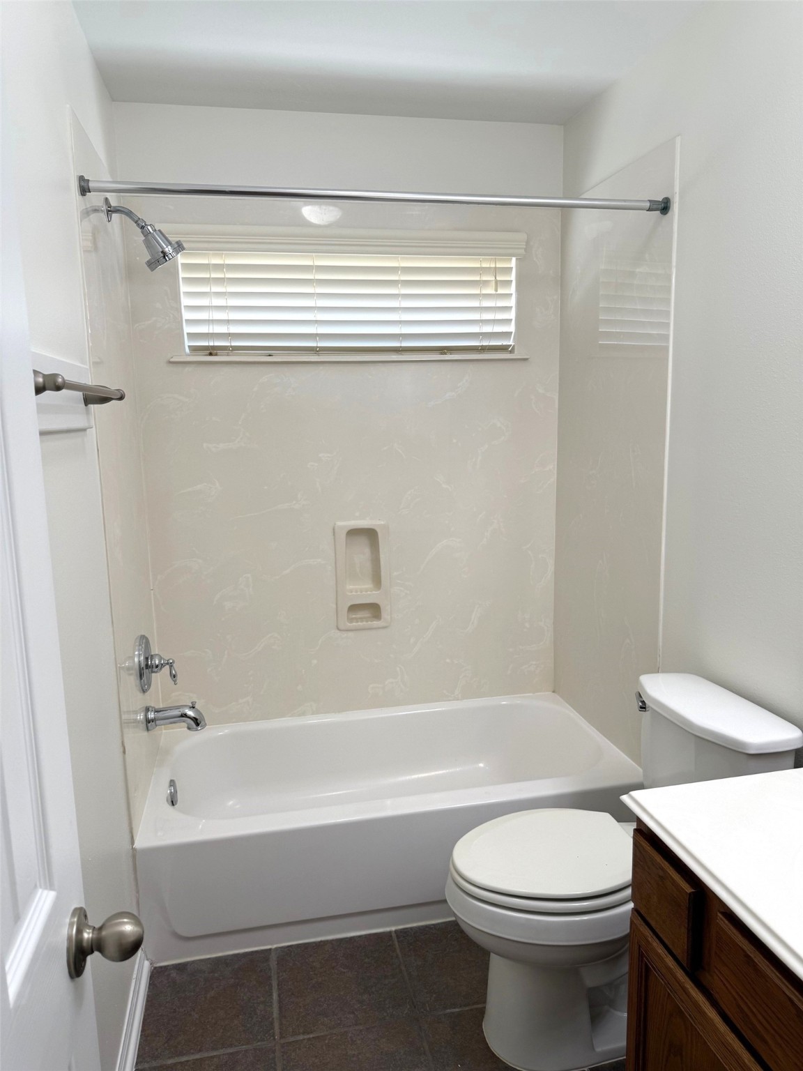 16818 Ranger Ridge Drive Cypress, TX 77429 - Photo 25 of 31 a bathroom with a sink a toilet and a bathtub