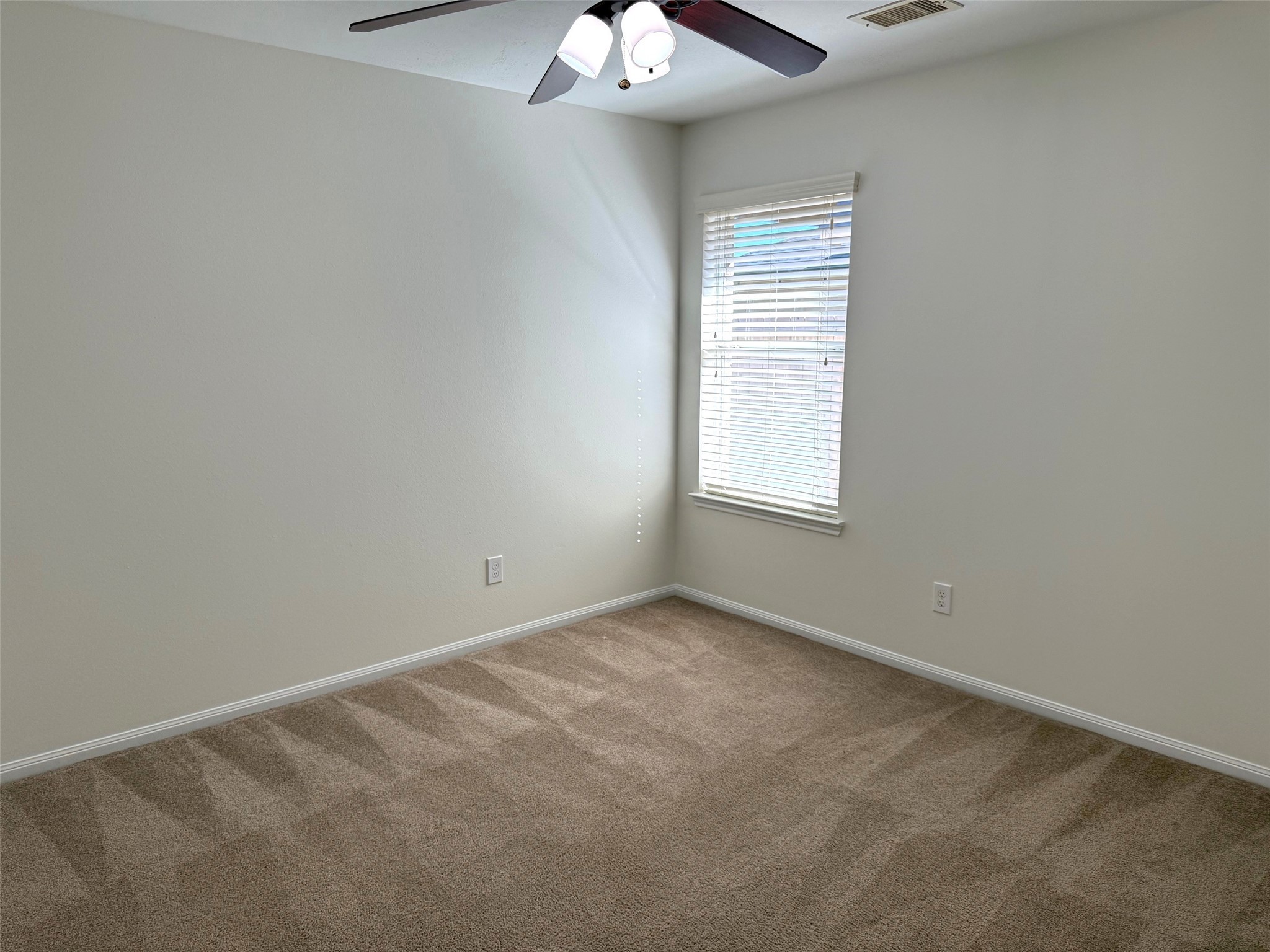 16818 Ranger Ridge Drive Cypress, TX 77429 - Photo 26 of 31 an empty room with a window