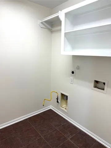 a view of a small space with racks on the wall