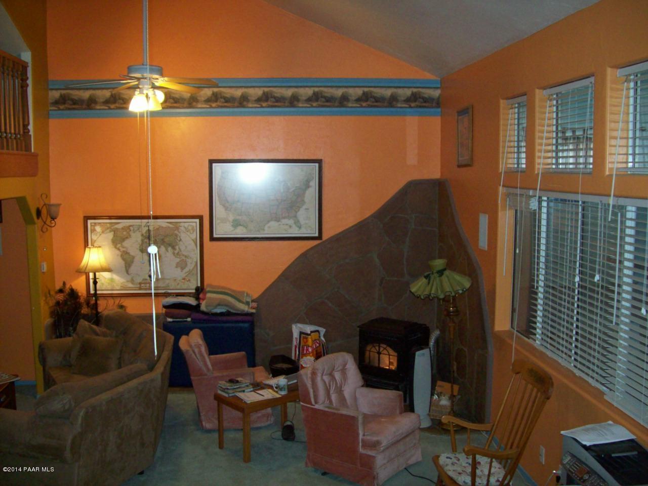 1800 West Big Sky Ranch Road Paulden, AZ 86334 - Photo 4 of 31 Den with pellet stove