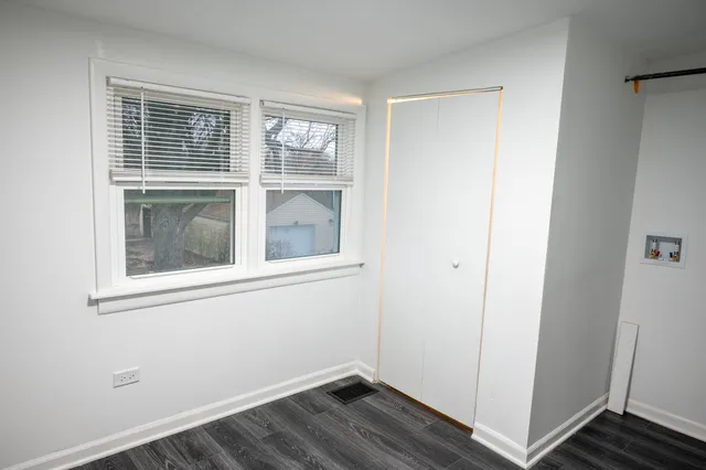 a view of empty room with windows