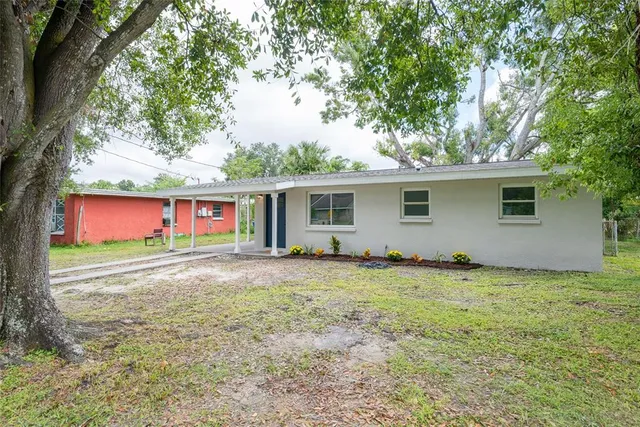 front view of a house with a yard
