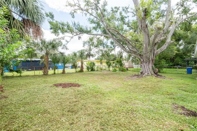 a view of outdoor space with deck and garden