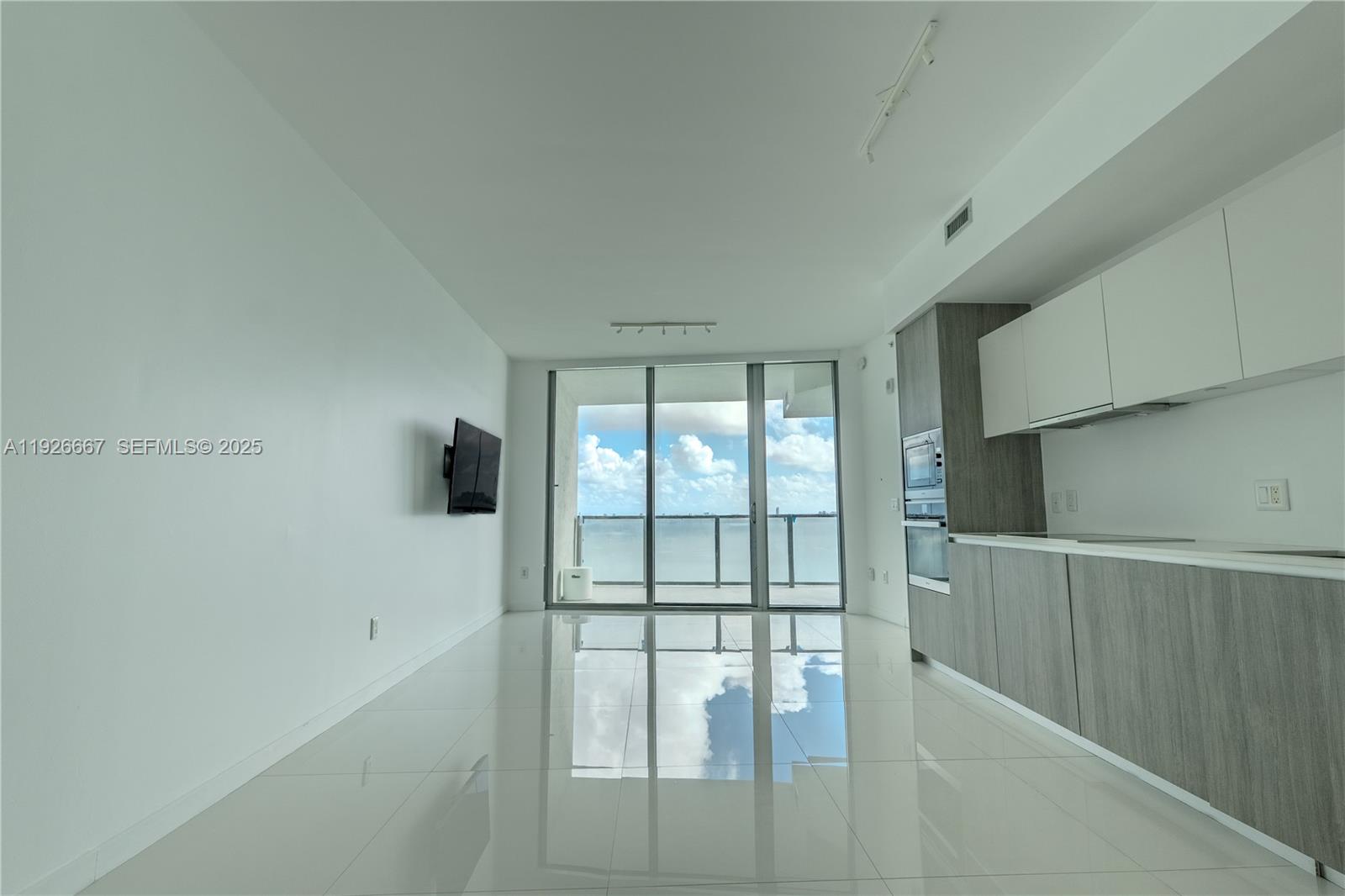 2900 Northeast 7th Avenue, Unit 2006 Miami, FL 33137 - Photo 9 of 16 a view of hallway with stairs