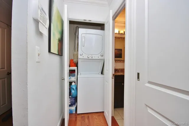a view of an entryway with wooden floor