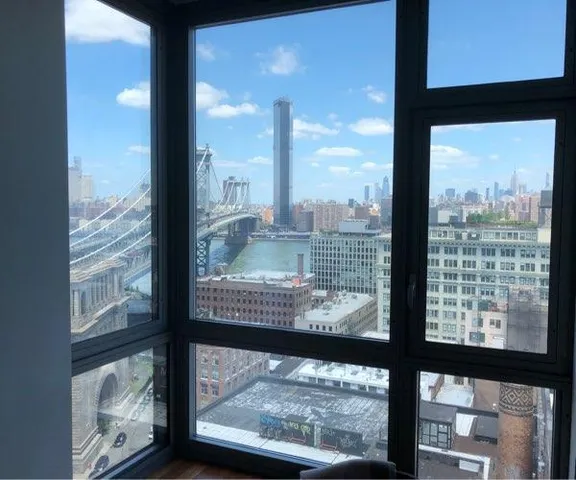 a view of an empty room and window