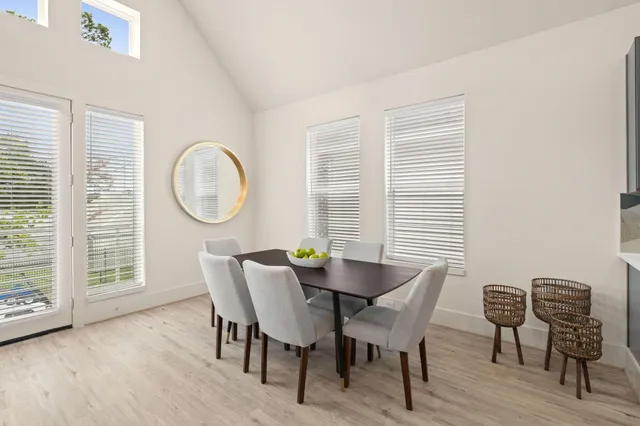 a room with a sink and a mirror